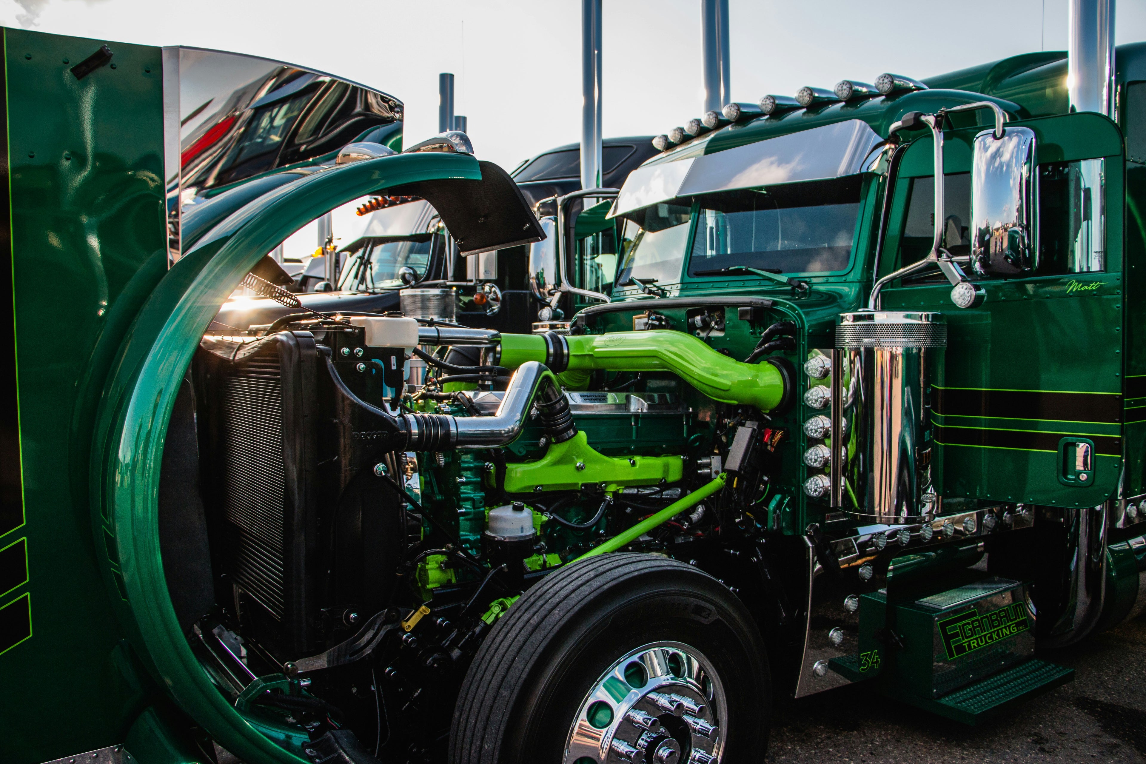 truck mechanic providing on-site mechanic services including fueling and oiling for heavy-duty trucks